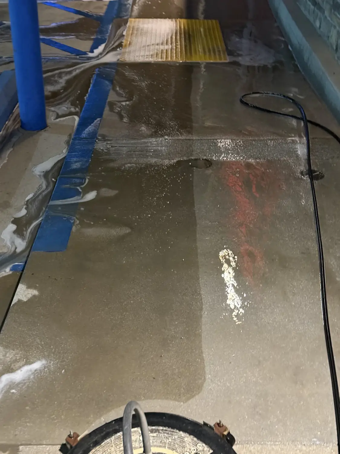 Surface cleaner pass on stained commercial concrete