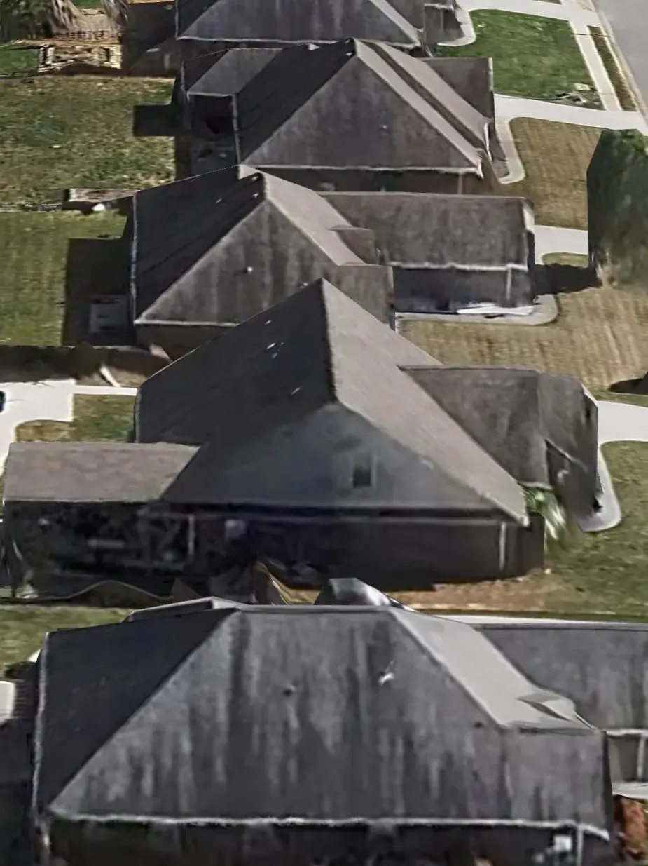 Satellite view of north side roofs with algae growth in Huntsville AL